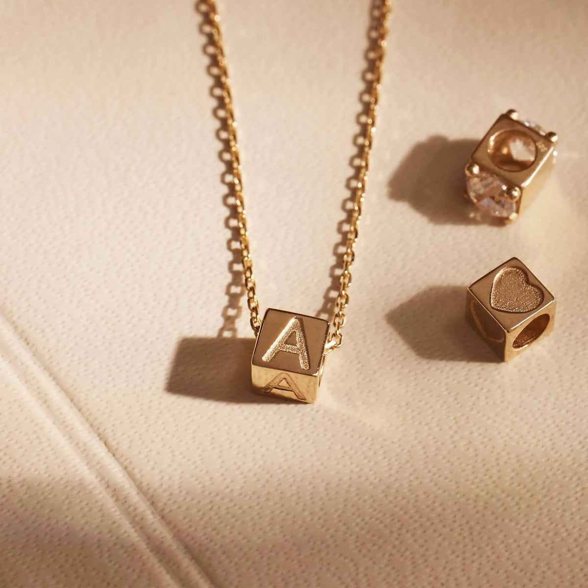 Le Marais Felie 14 karat gold cube initial charm with letter