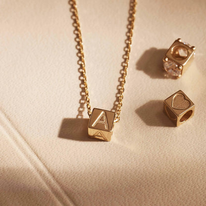 Le Marais Felie 14 karat gold cube initial charm with letter